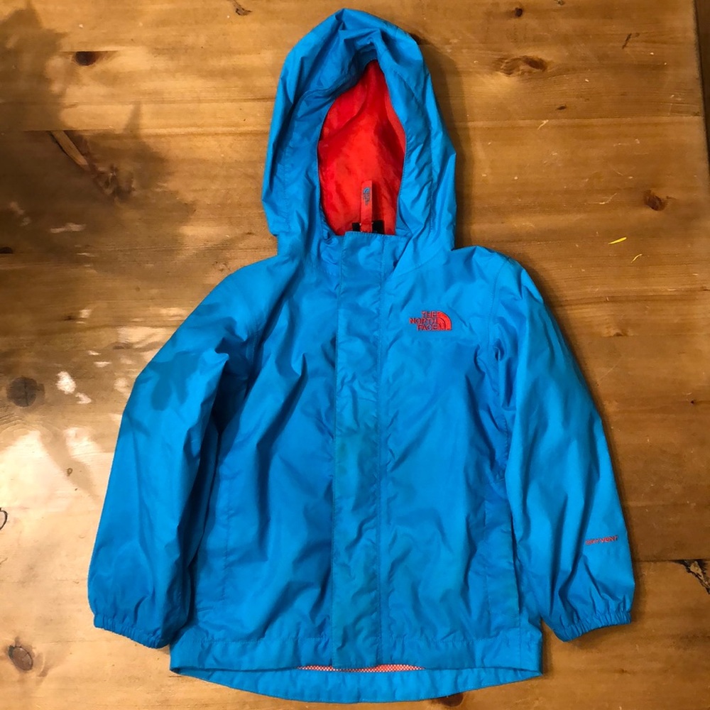 3T blue and red North Face rain jacket